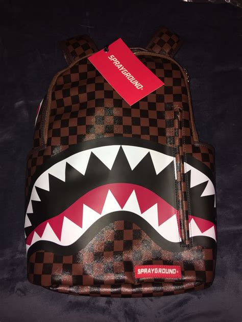 sprayground copy louis vuitton.